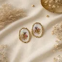 White Raisin Floral Studs.webp